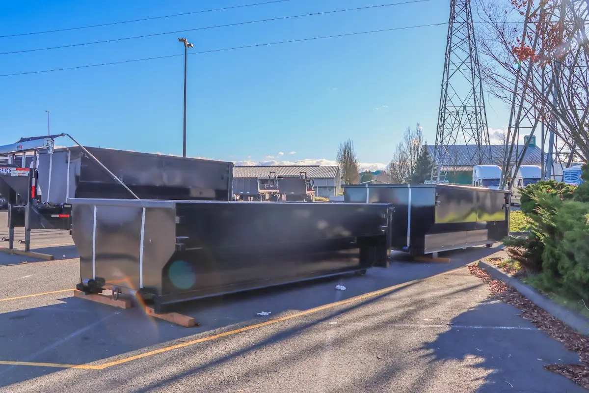 Roll-off dumpster ready for waste disposal at job site for Construction Dumpster Rental in Lonsdale